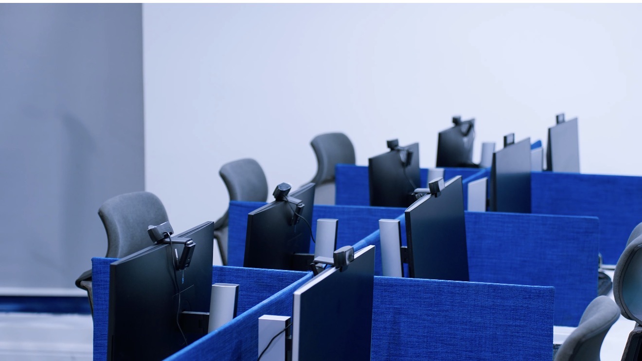 Roche Abuja workstation detail with blue desk partitions